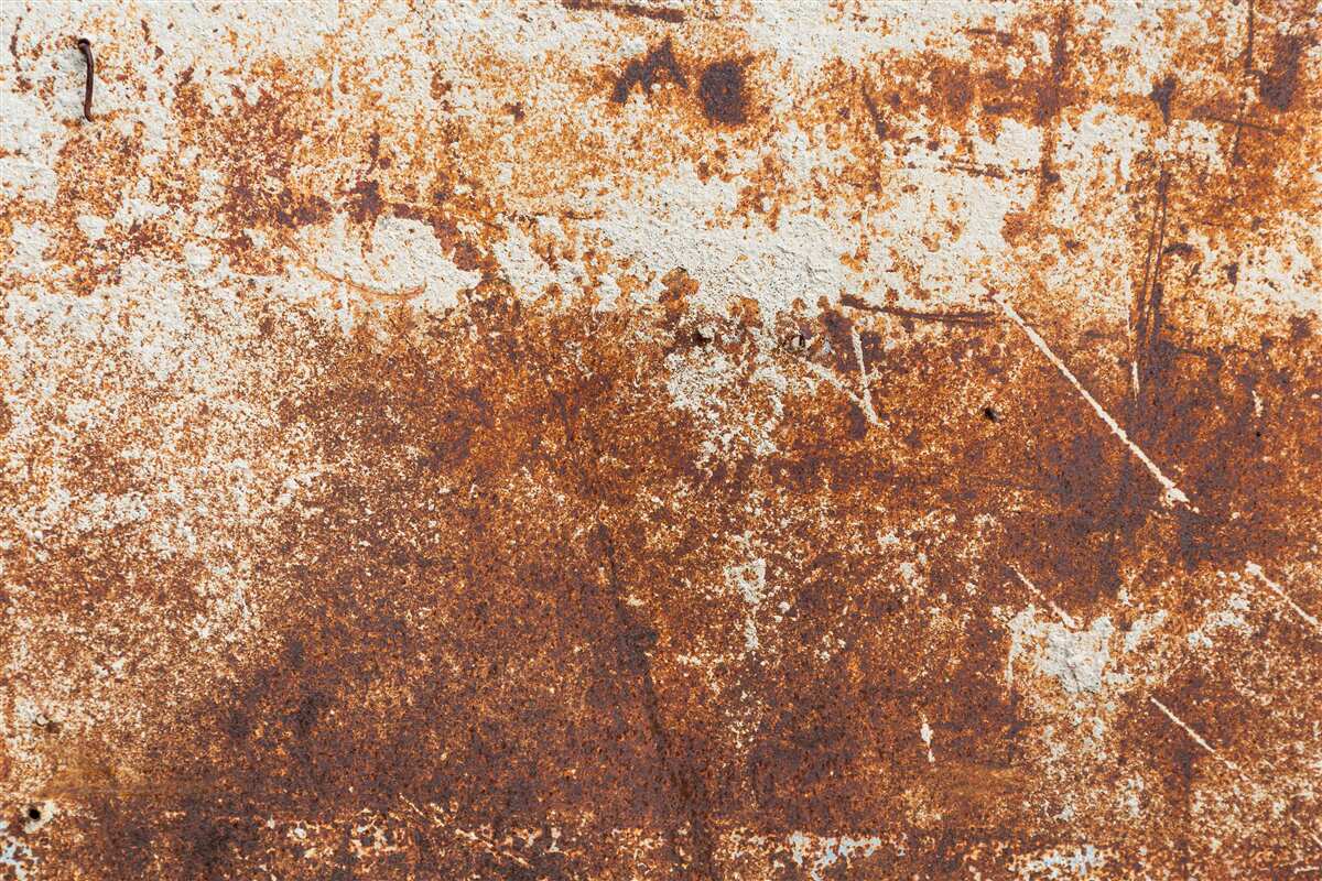 Fototapeta odrapana ściana pomalowana na ciemne odcienie rdzy