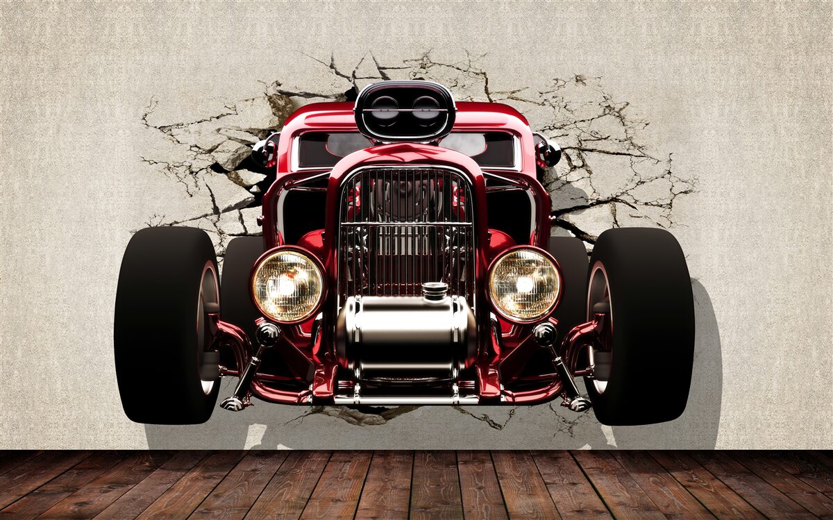 Fototapeta ze ściany wyjeżdża czerwony samochód