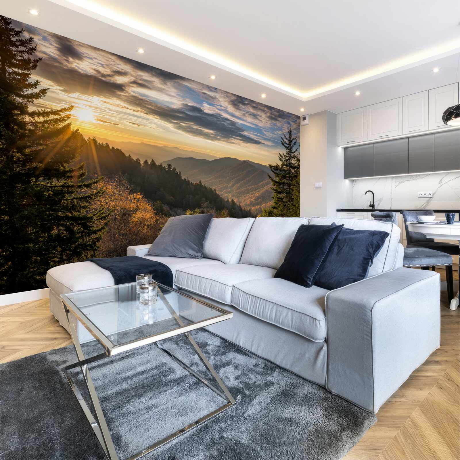 Fototapeta zachodzące słońce nad górskimi szczytami