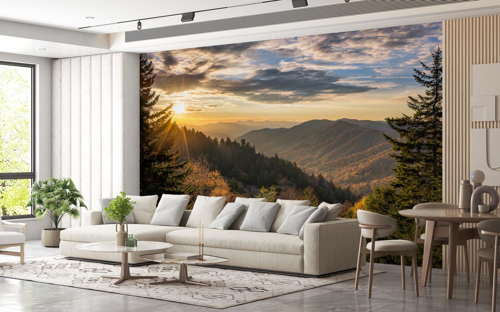 Fototapeta zachodzące słońce nad górskimi szczytami