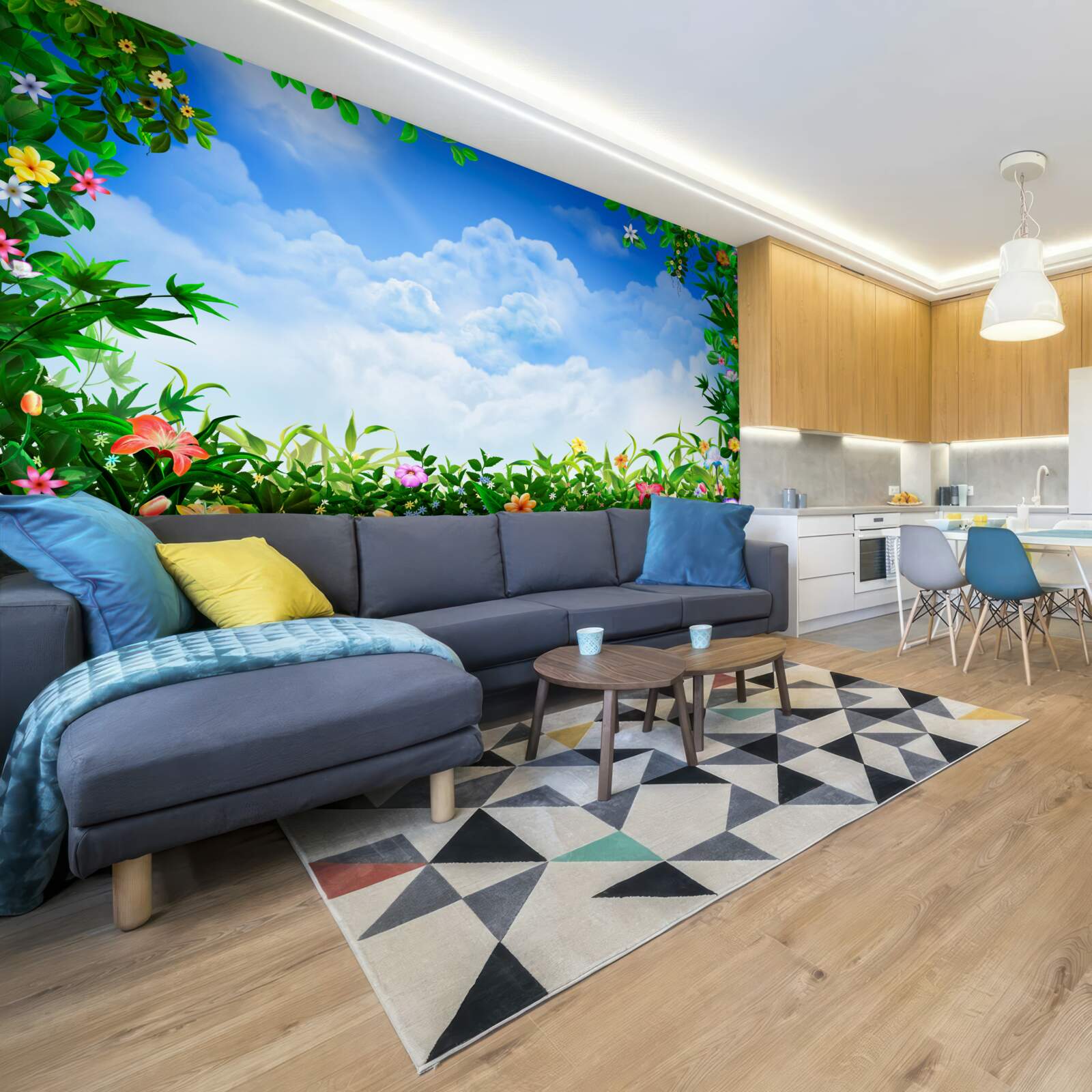 Fototapeta zielone liście mienią się pod błękitnymi chmurami