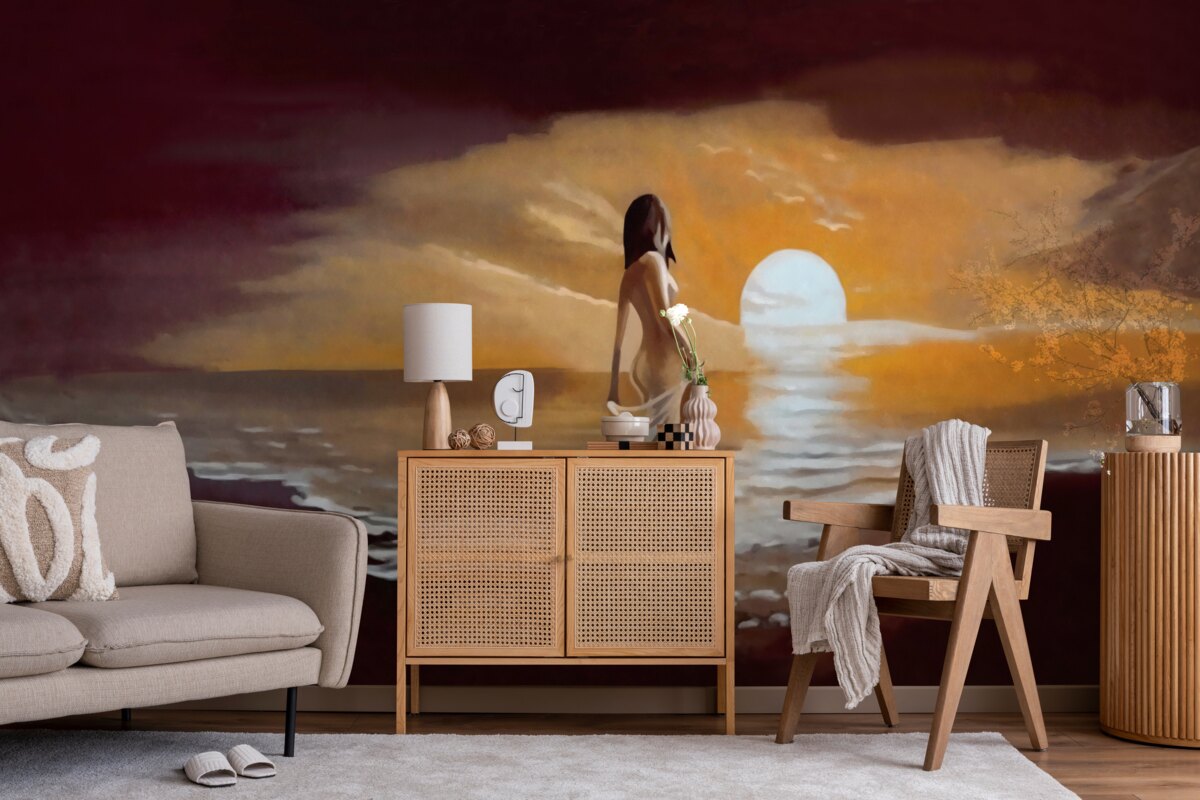 Fototapeta dziewczyna ogląda zachód słońca nad brzegiem morza