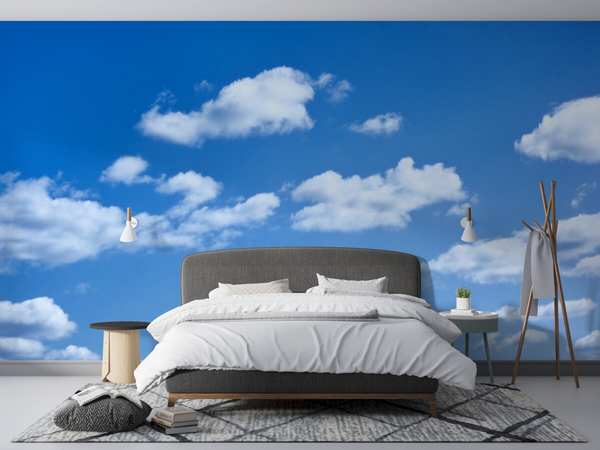 Fototapeta białe chmury unoszące się na błękitnym niebie