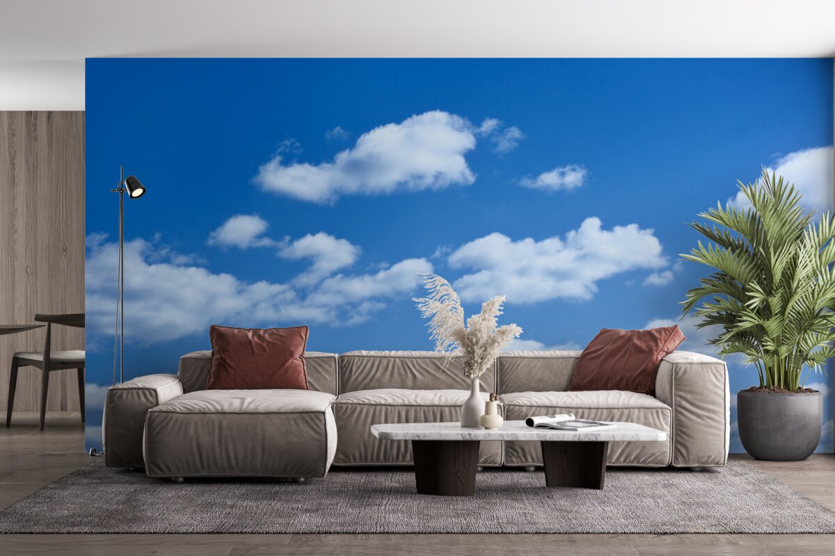 Fototapeta białe chmury unoszące się na błękitnym niebie