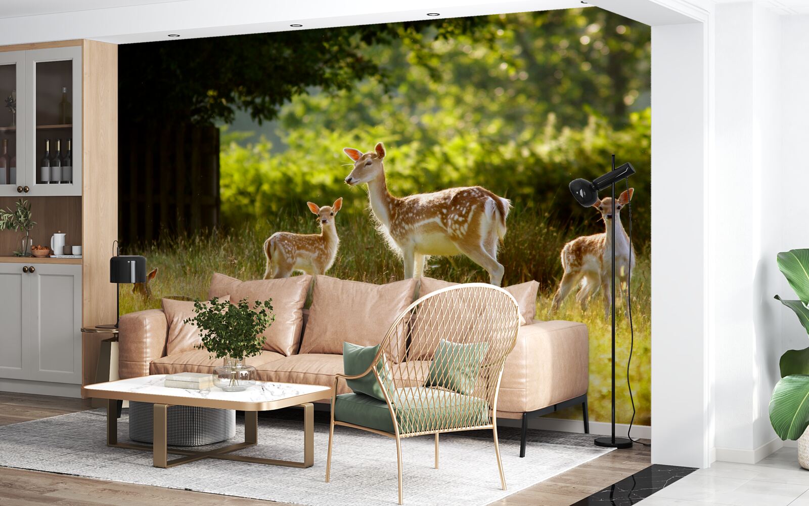 Fototapeta na polu pasie się grupa jeleni z cętkowaną sierścią