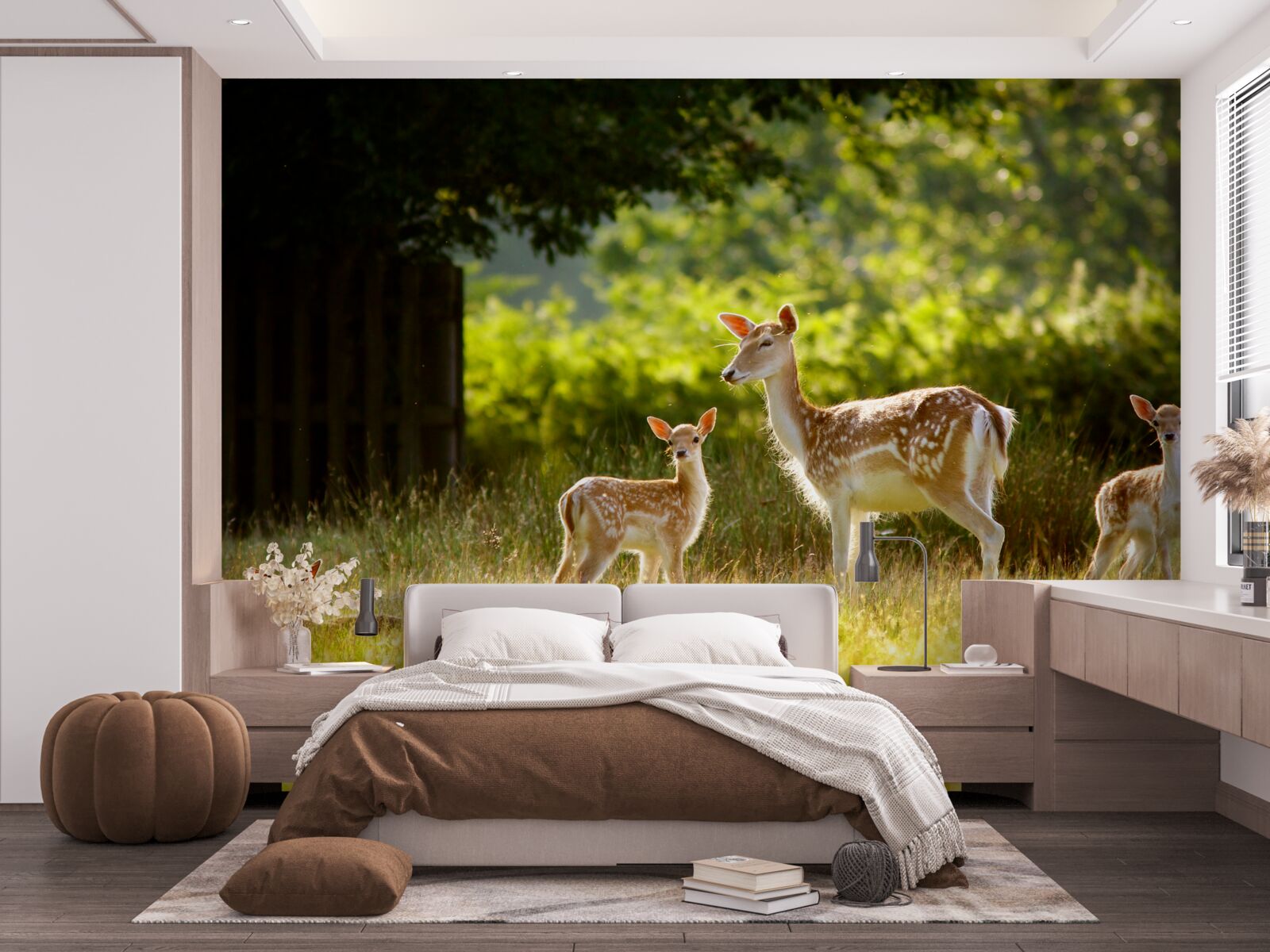 Fototapeta na polu pasie się grupa jeleni z cętkowaną sierścią