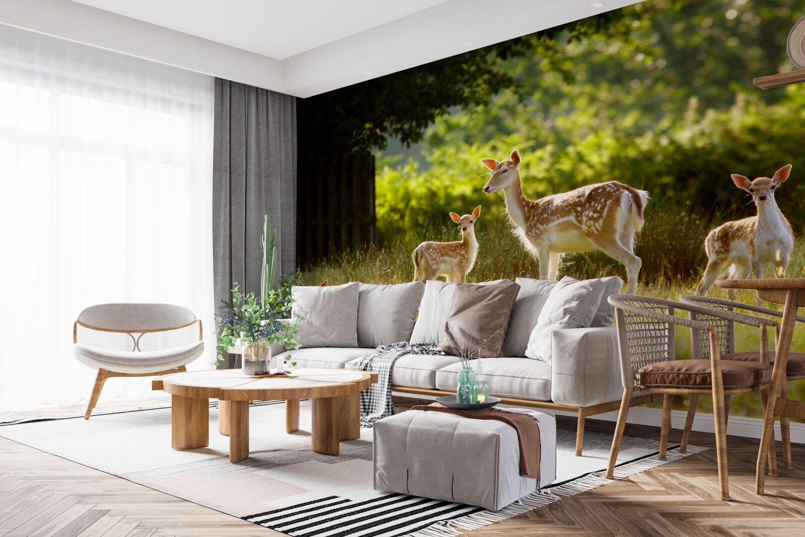 Fototapeta na polu pasie się grupa jeleni z cętkowaną sierścią