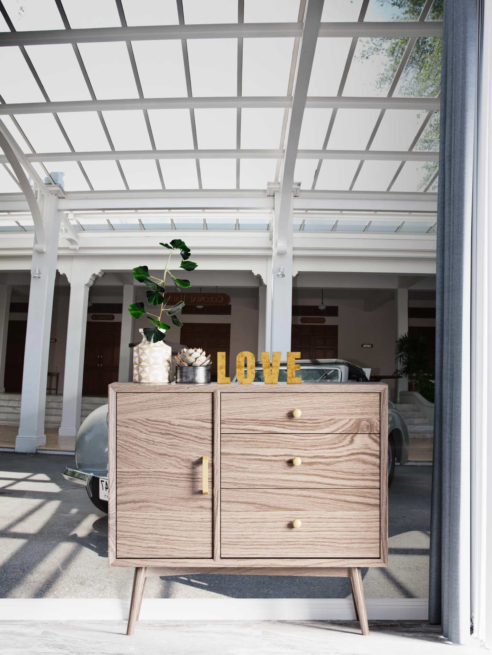 Fototapeta stary szary samochód w pobliżu budynku