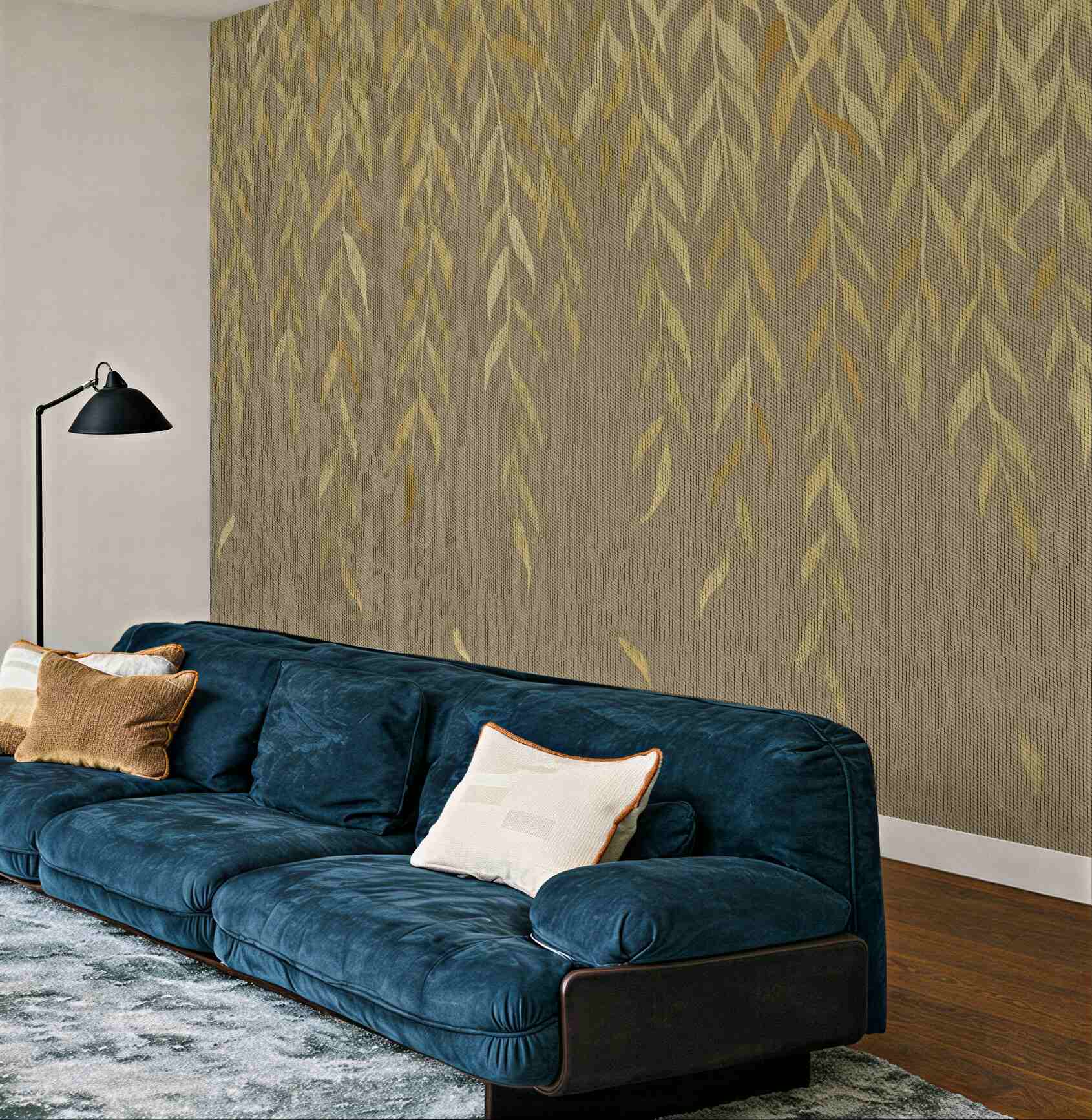 Fototapeta Gałęzie wierzby z liśćmi w odcieniach żółci i zieleni opadające na brązowym płóciennym tle.