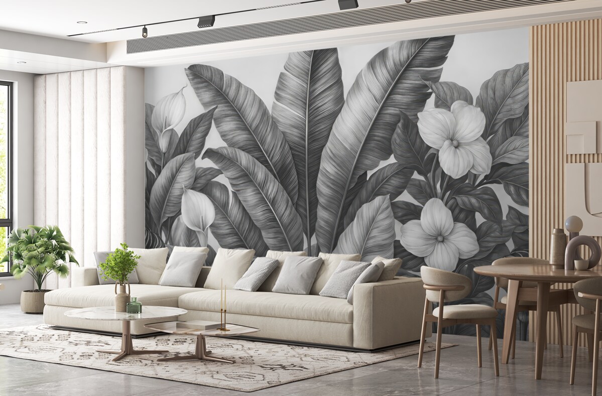 Fototapeta Stylowe tropikalne liście z kwiatami w odcieniach czerni i bieli.