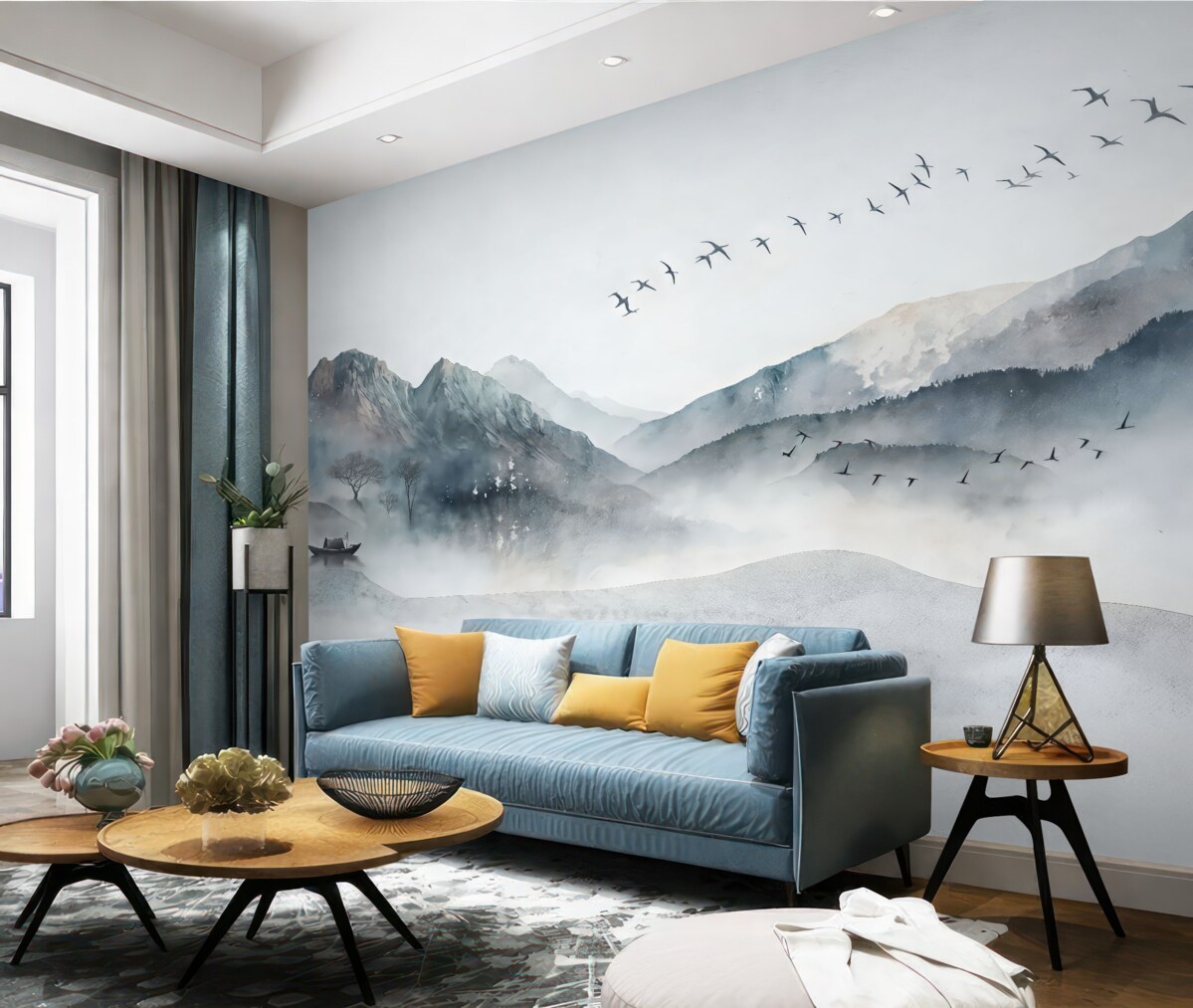 Fototapeta Pejzaż z górami w oddali, z kilkoma drzewami dostrzegalnymi na pierwszym planie, spokojny.