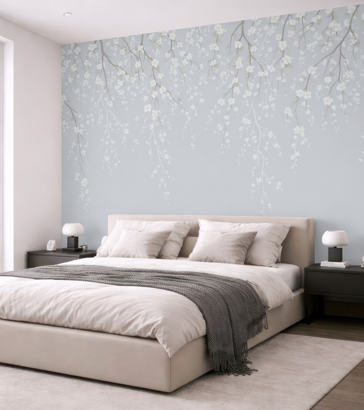 Fototapeta Opadające subtelne gałązki z kwiatami na błękitnym tle.