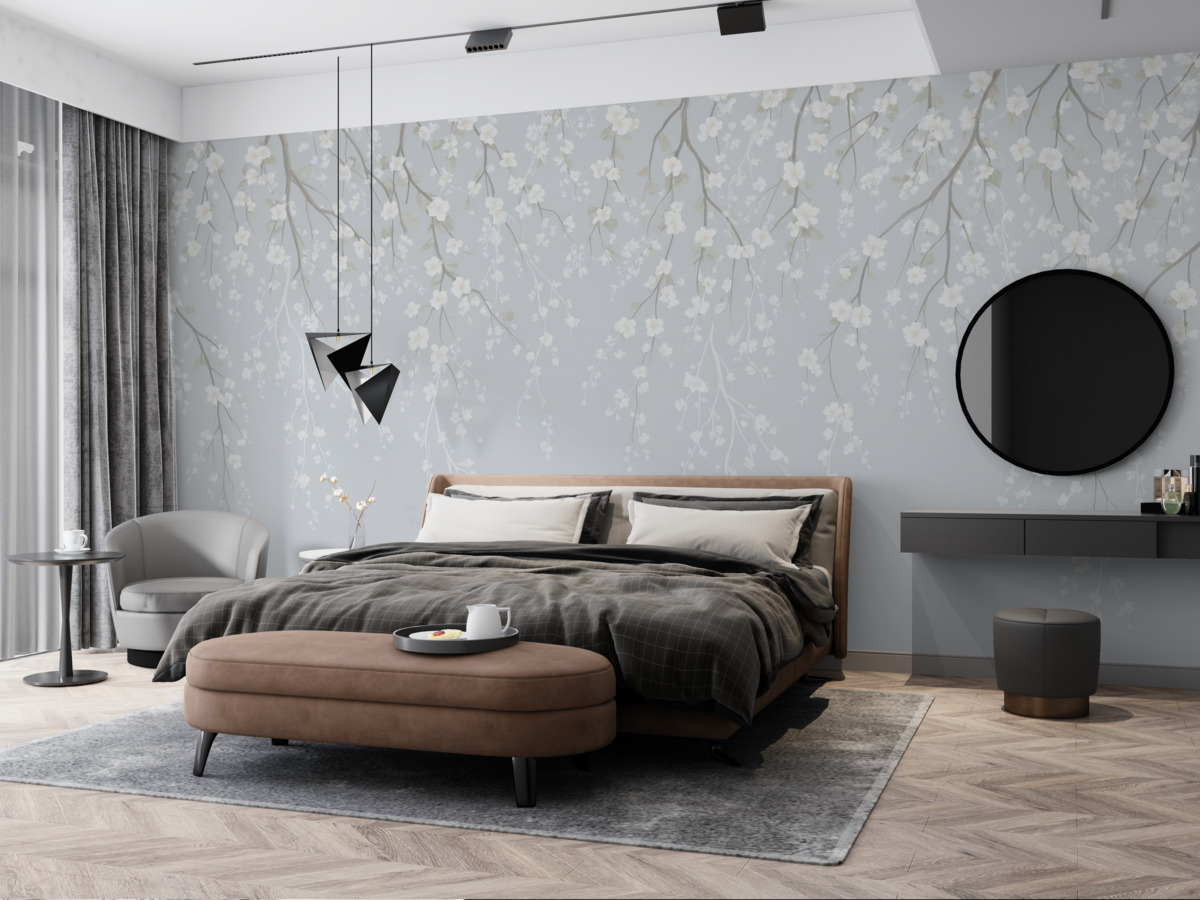 Fototapeta Opadające subtelne gałązki z kwiatami na błękitnym tle.