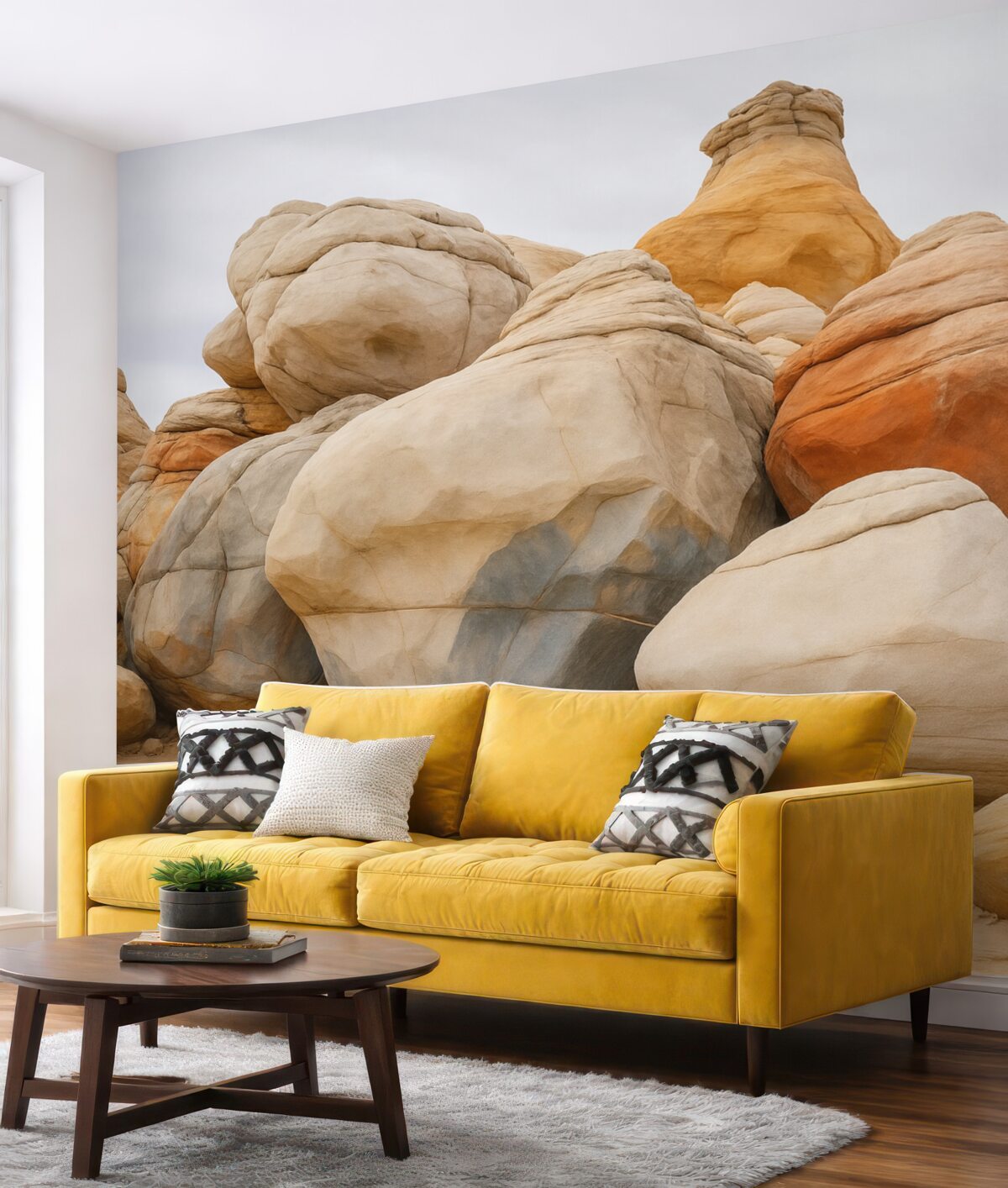 Fototapeta Wielkie kamienie na piasku przypominające akwarelę.