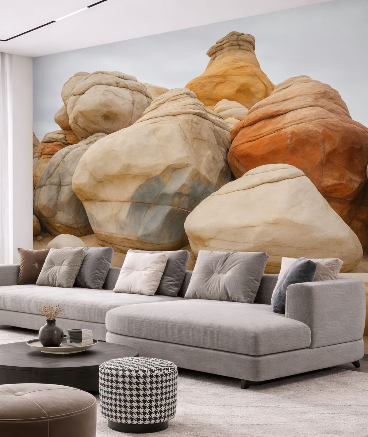 Fototapeta Wielkie kamienie na piasku przypominające akwarelę.