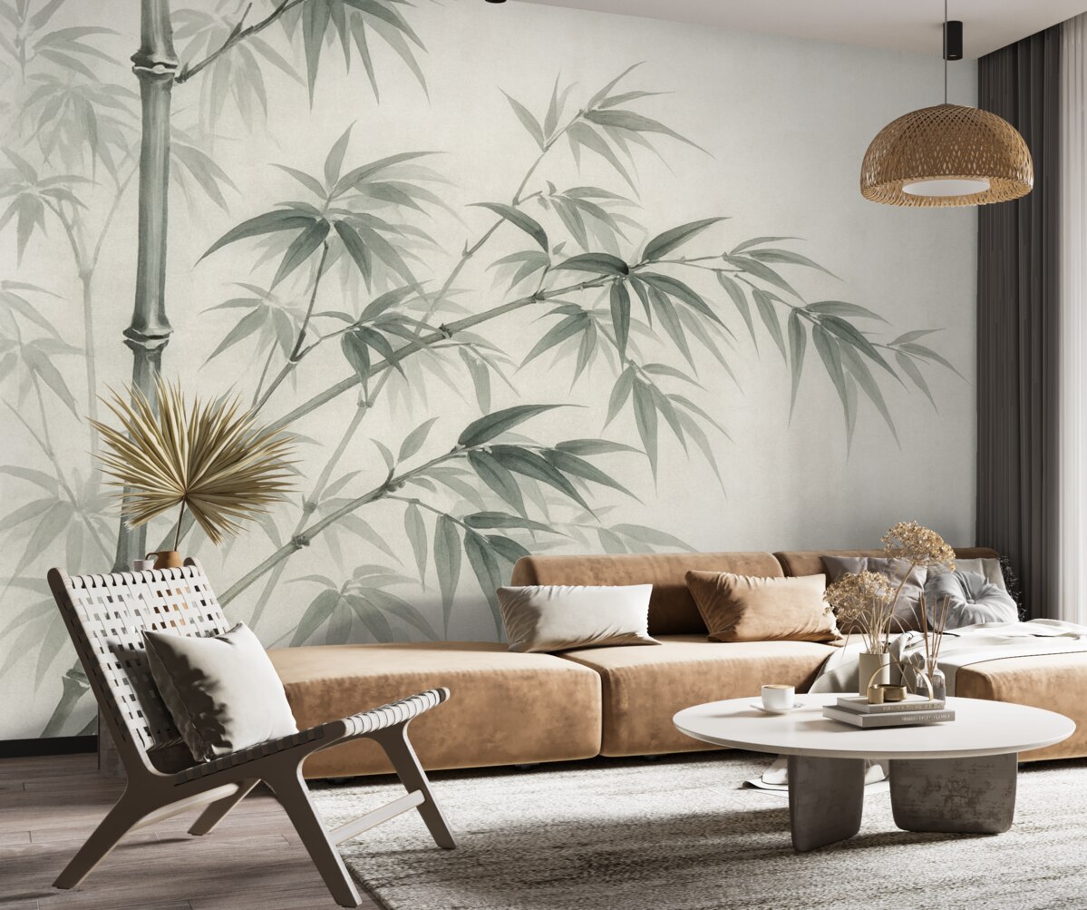 Fototapeta Liście bambusa na jasnym, plamkowanym tle przypominającym akwarelę.