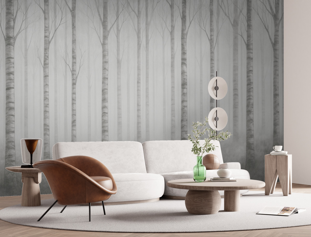 Fototapeta Pnie drzew w mgle w odcieniach szarości.