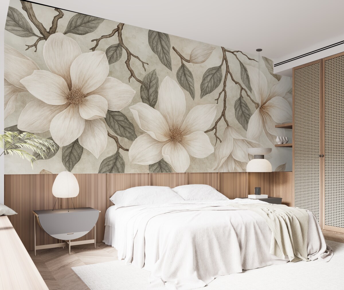 Fototapeta Subtelne różowe i białe kwiaty magnolii z zielonymi liśćmi na jasnym tle, łagodna, kwiatowa aranżacja.