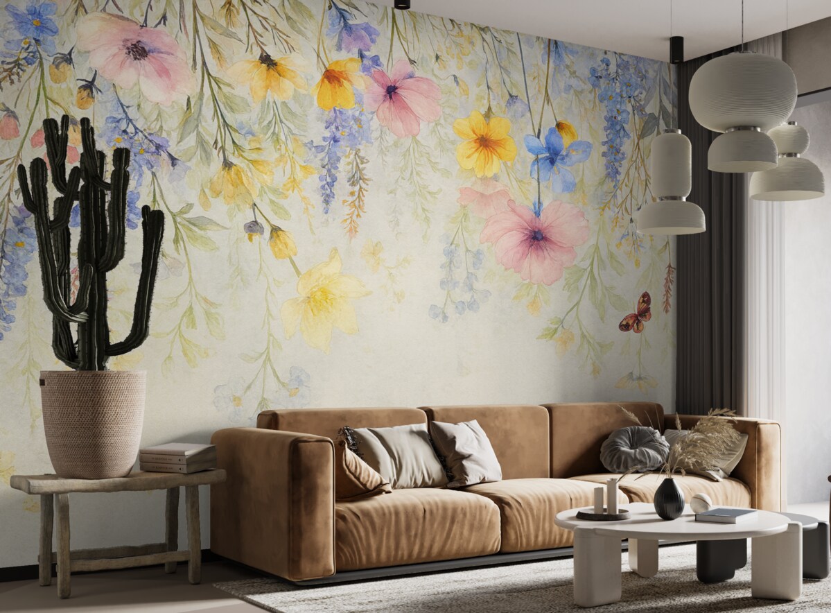 Fototapeta Kolorowe kwiaty o różowych, żółtych i niebieskich płatkach zwisające z góry na fakturowanym szarym tle.