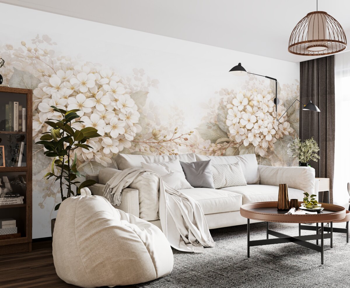 Fototapeta Subtelne białe kwiaty hortensji z gładkimi zielonymi liśćmi na jasnym tle.