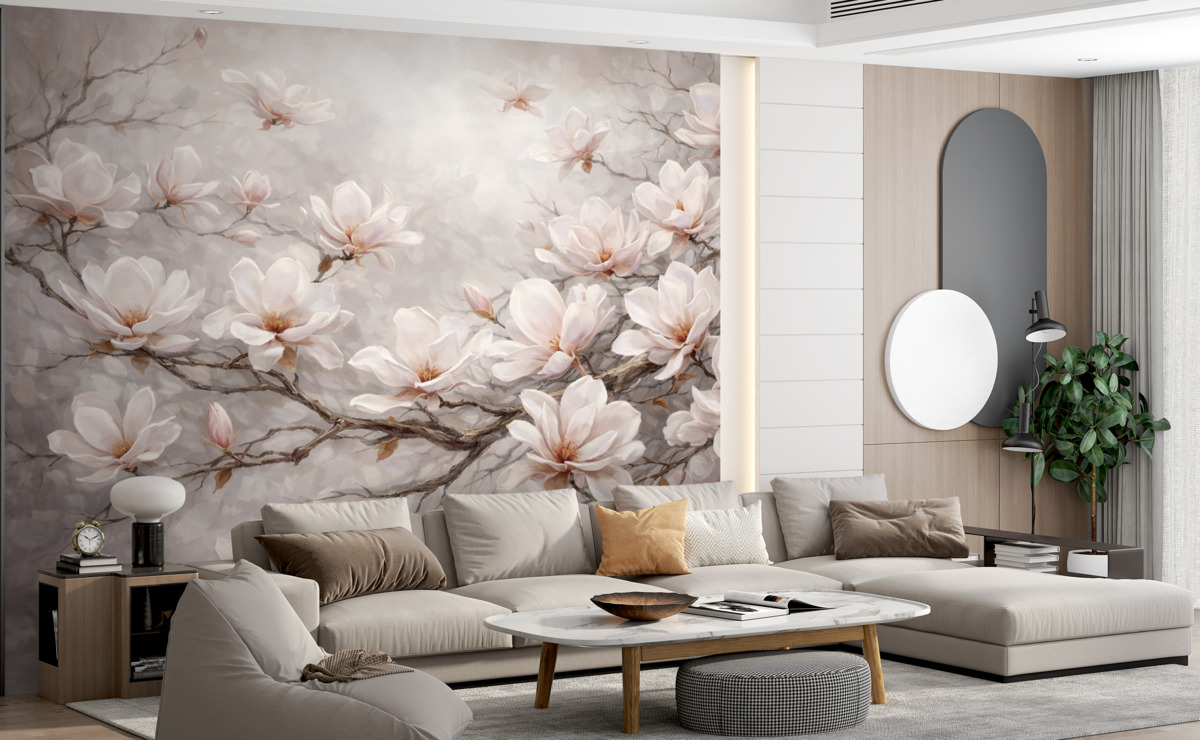 Fototapeta Subtelne różowe kwiaty magnolii rozkwitające na odsłoniętych konarach drzew na łagodnym, przydymionym tle.