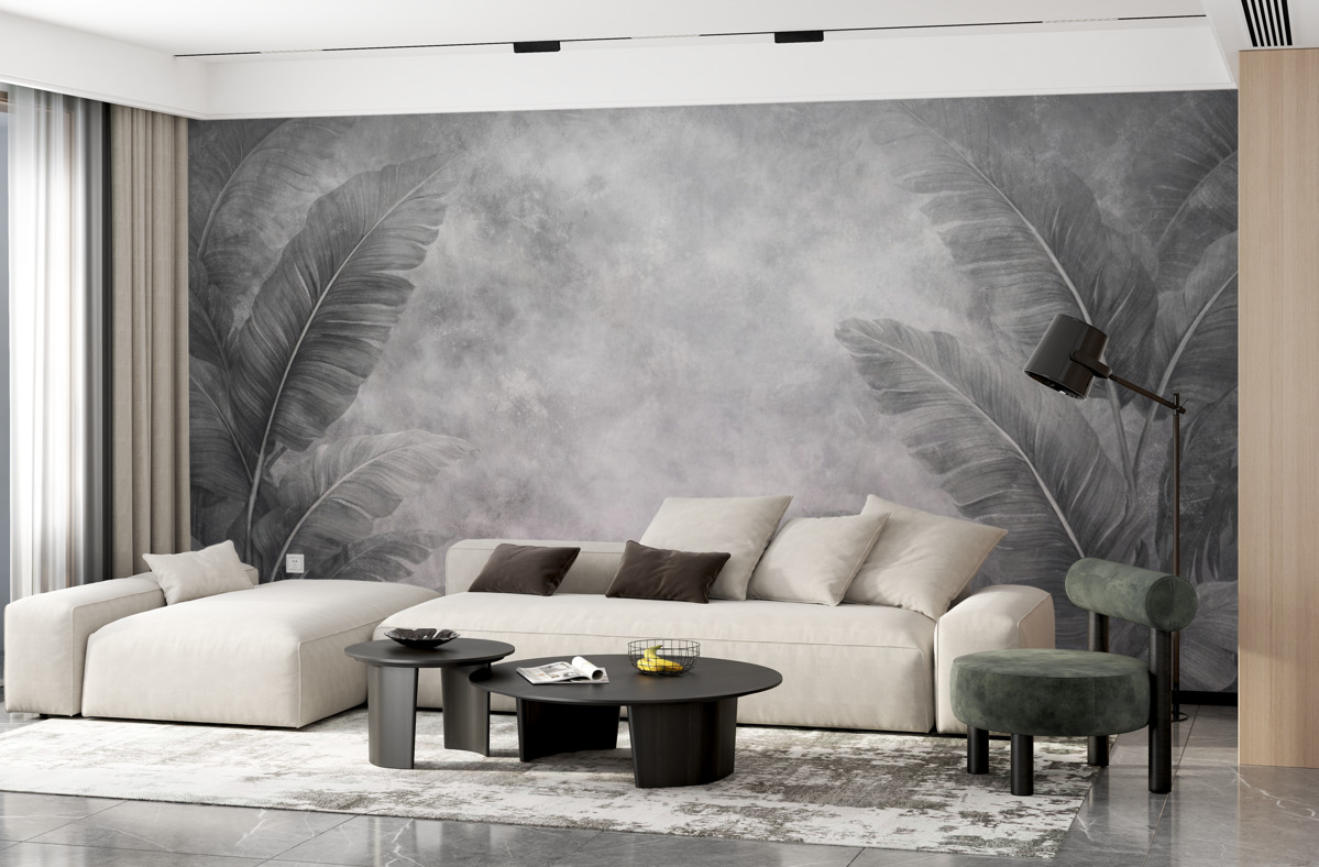 Fototapeta Ogromne liście bananowca na postarzałej ścianie.